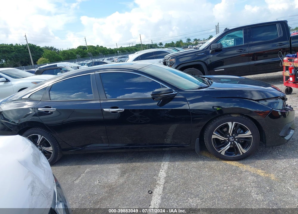 2016 HONDA CIVIC TOURING VIN: 19XFC1F95GE021523