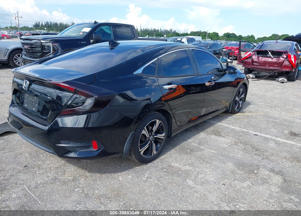 2016 HONDA CIVIC TOURING VIN: 19XFC1F95GE021523