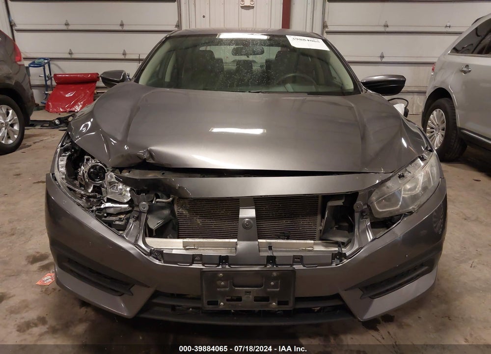 2018 HONDA CIVIC LX VIN: 19XFC2F5XJE005554