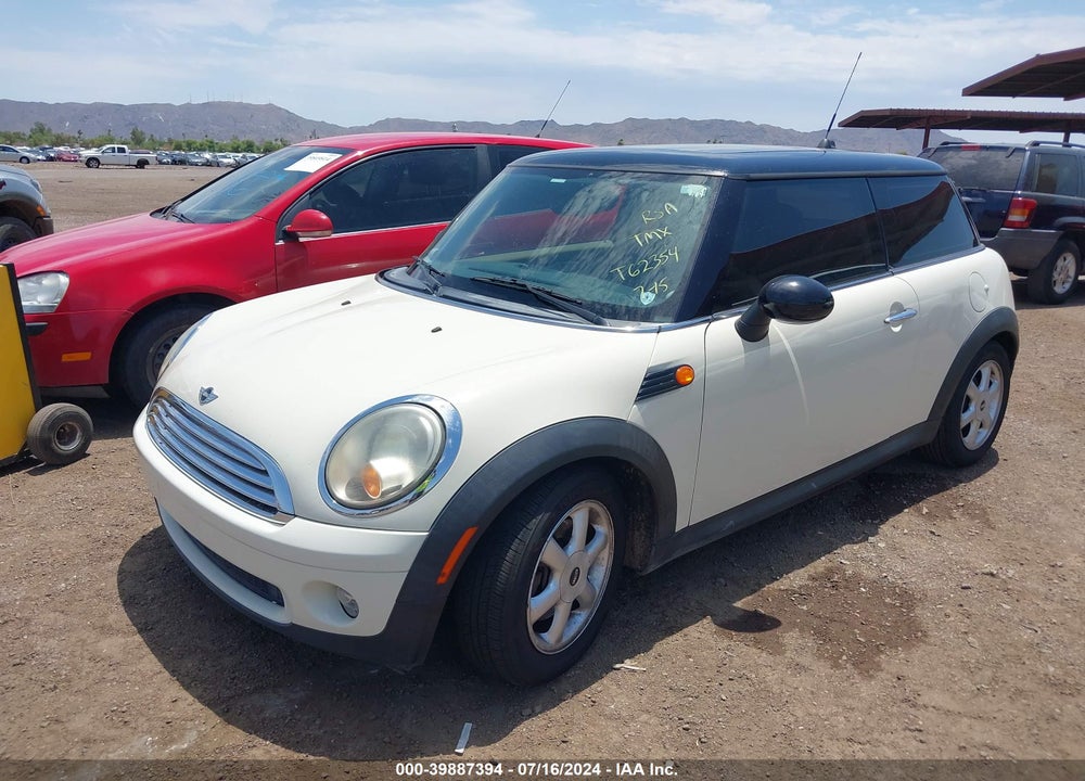 2008 MINI COOPER VIN: WMWMF33518TT62354