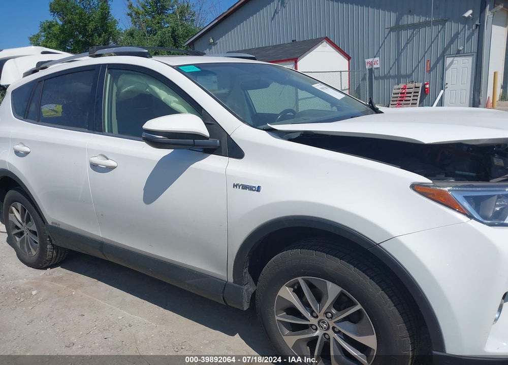 2016 TOYOTA RAV4 HYBRID XLE VIN: JTMRJREV9GD055854
