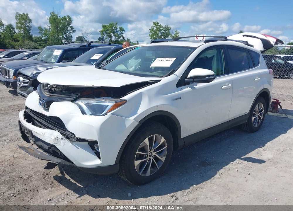 2016 TOYOTA RAV4 HYBRID XLE VIN: JTMRJREV9GD055854