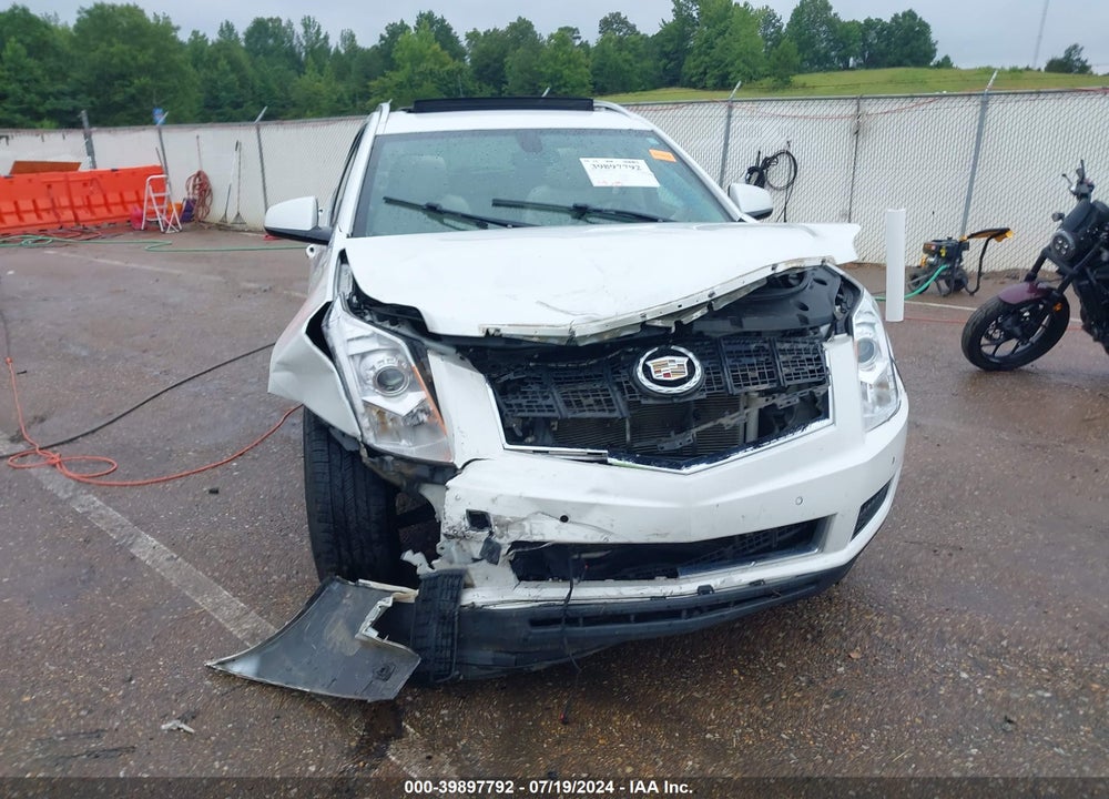 2014 CADILLAC SRX LUXURY COLLECTION VIN: 3GYFNBE39ES526597