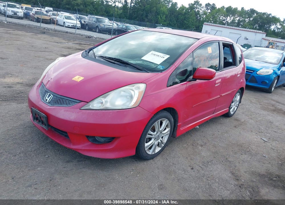 2010 HONDA FIT VIN: JHMGE8H49AC003483
