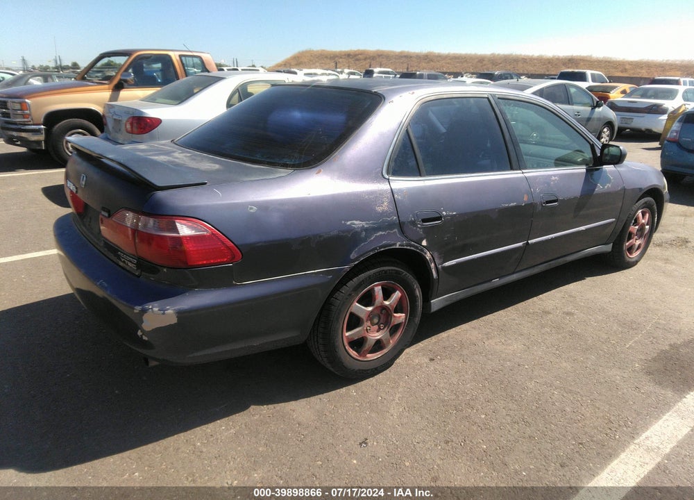2000 HONDA ACCORD 2.3 LX VIN: 3HGCG6653YG705382