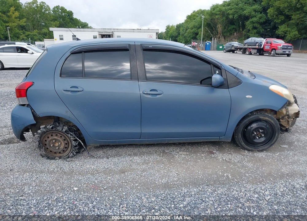 2009 TOYOTA YARIS VIN: JTDKT903195229544