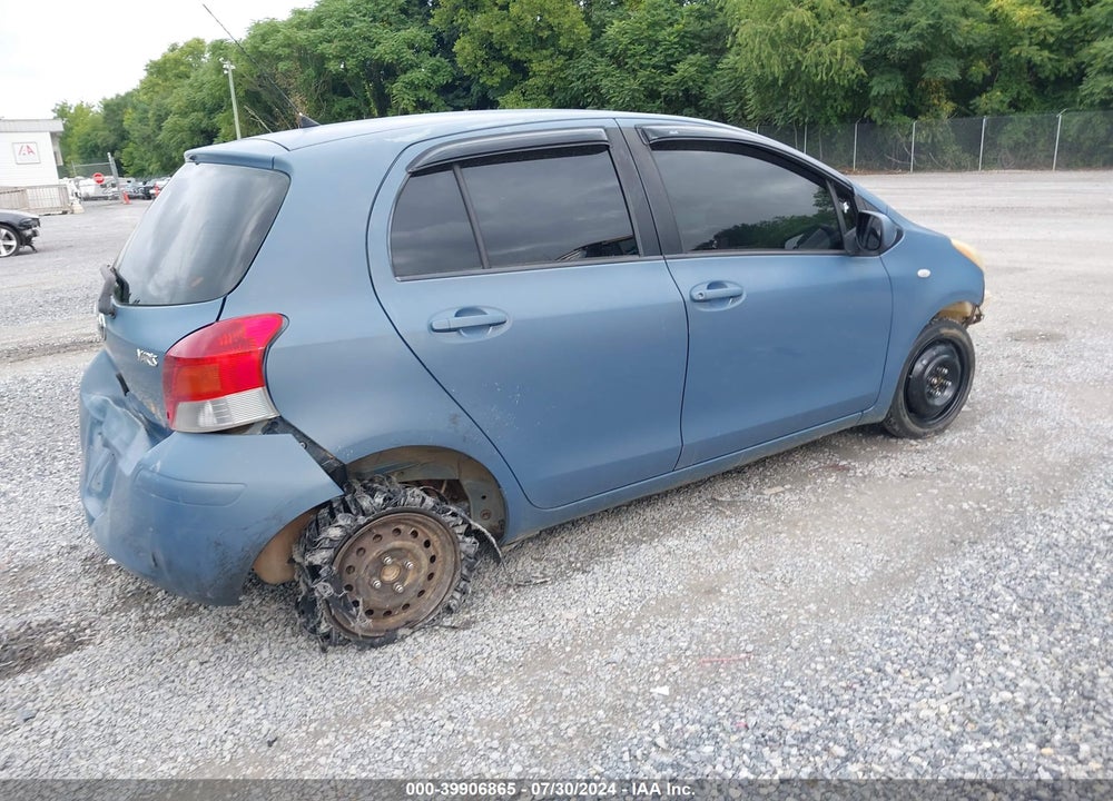 2009 TOYOTA YARIS VIN: JTDKT903195229544