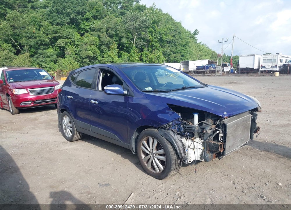 2012 HYUNDAI TUCSON LIMITED VIN: KM8JUCACXCU435538