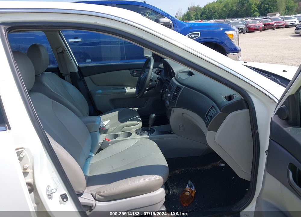 2009 KIA OPTIMA EX VIN: KNAGE228695291115