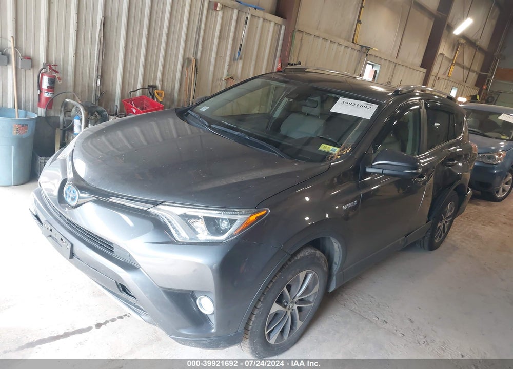 2018 TOYOTA RAV4 HYBRID XLE VIN: JTMRJREV7JD247653