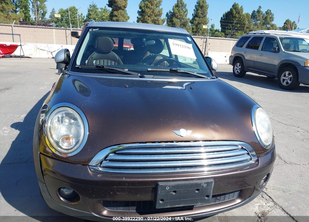 2009 MINI COOPER VIN: WMWML33569TX34071