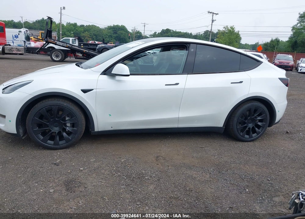 2023 TESLA MODEL Y AWD/LONG RANGE DUAL MOTOR ALL-WHEEL DRIVE VIN: 7SAYGDEE7PA054465