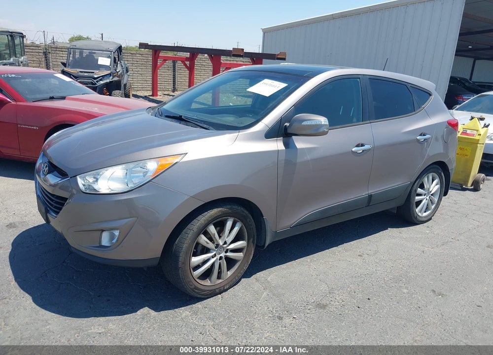 2012 HYUNDAI TUCSON LIMITED VIN: KM8JUCAC5CU383574
