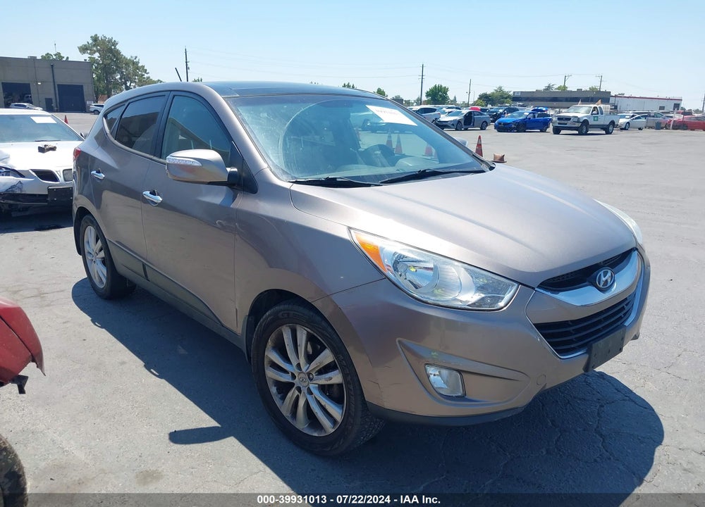 2012 HYUNDAI TUCSON LIMITED VIN: KM8JUCAC5CU383574