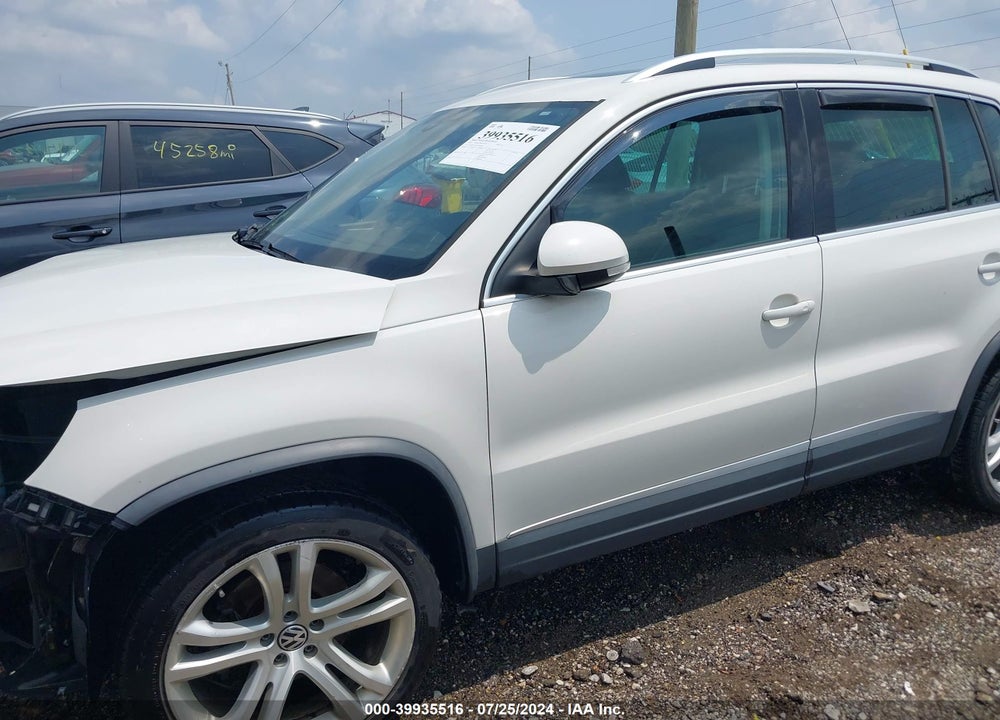 2012 VOLKSWAGEN TIGUAN SEL VIN: WVGBV7AX9CW560093