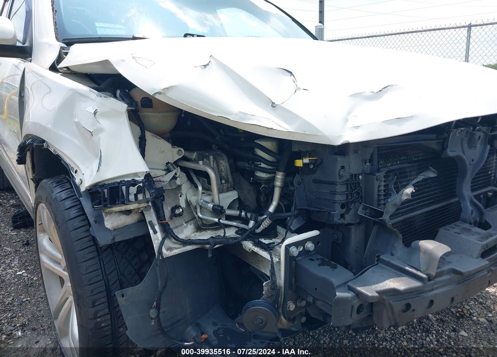 2012 VOLKSWAGEN TIGUAN SEL VIN: WVGBV7AX9CW560093