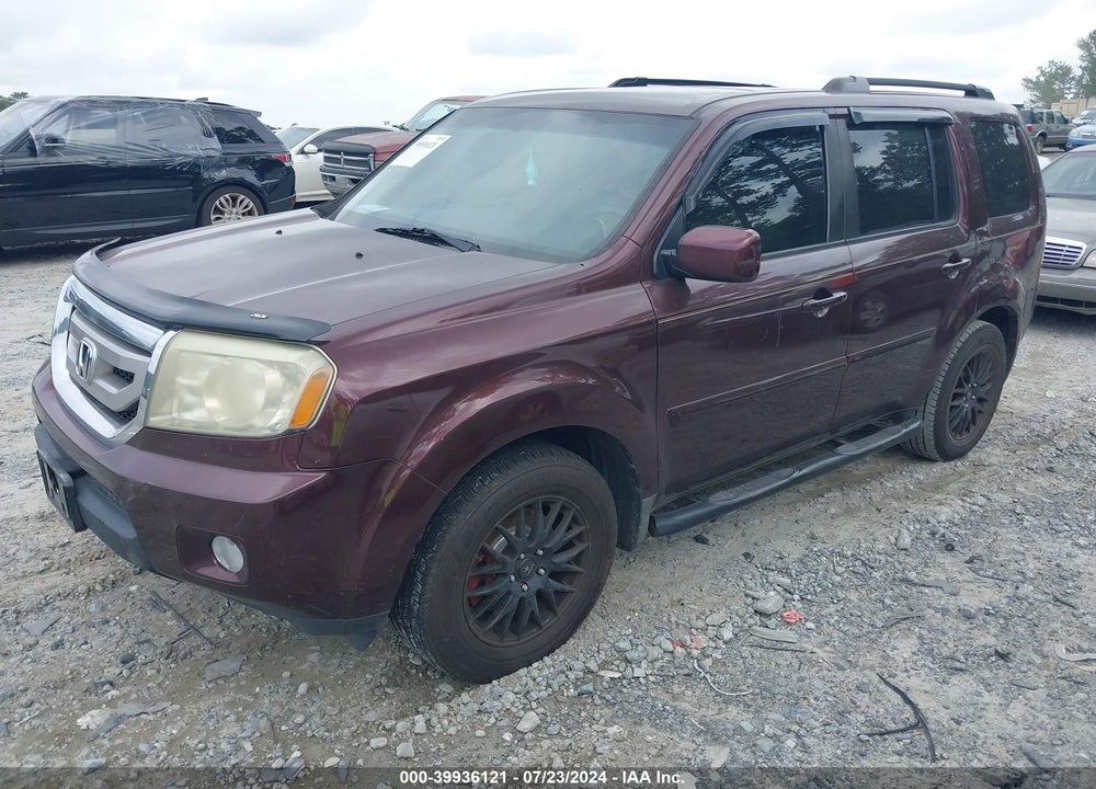 2009 HONDA PILOT EX-L VIN: 5FNYF385X9B021620