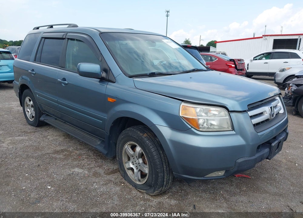 2007 HONDA PILOT EX-L VIN: 2HKYF18527H525100