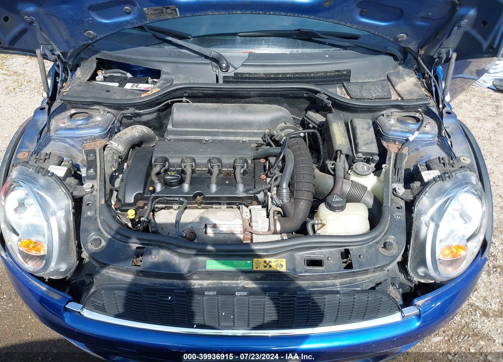 2007 MINI COOPER S VIN: WMWMF73597TL90831