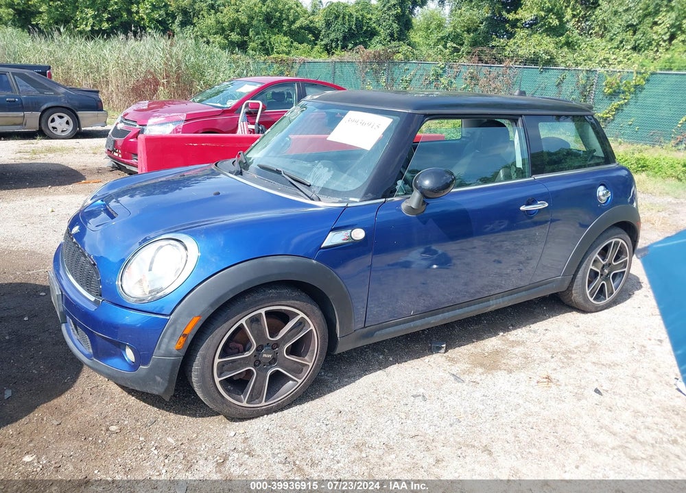 2007 MINI COOPER S VIN: WMWMF73597TL90831