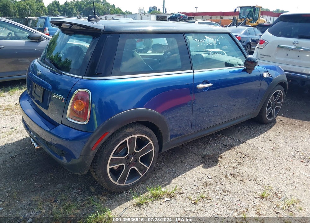 2007 MINI COOPER S VIN: WMWMF73597TL90831