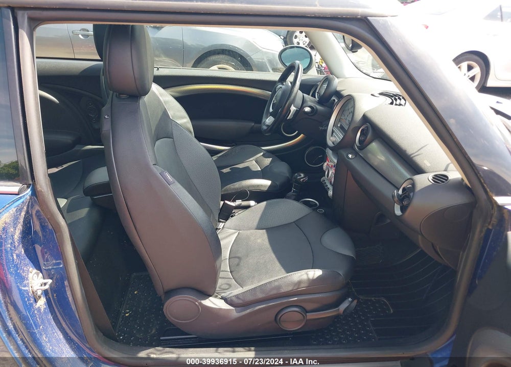 2007 MINI COOPER S VIN: WMWMF73597TL90831