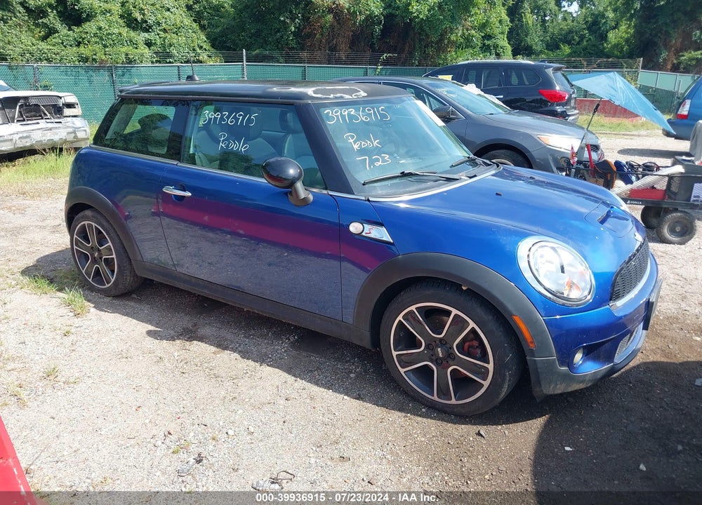 2007 MINI COOPER S VIN: WMWMF73597TL90831