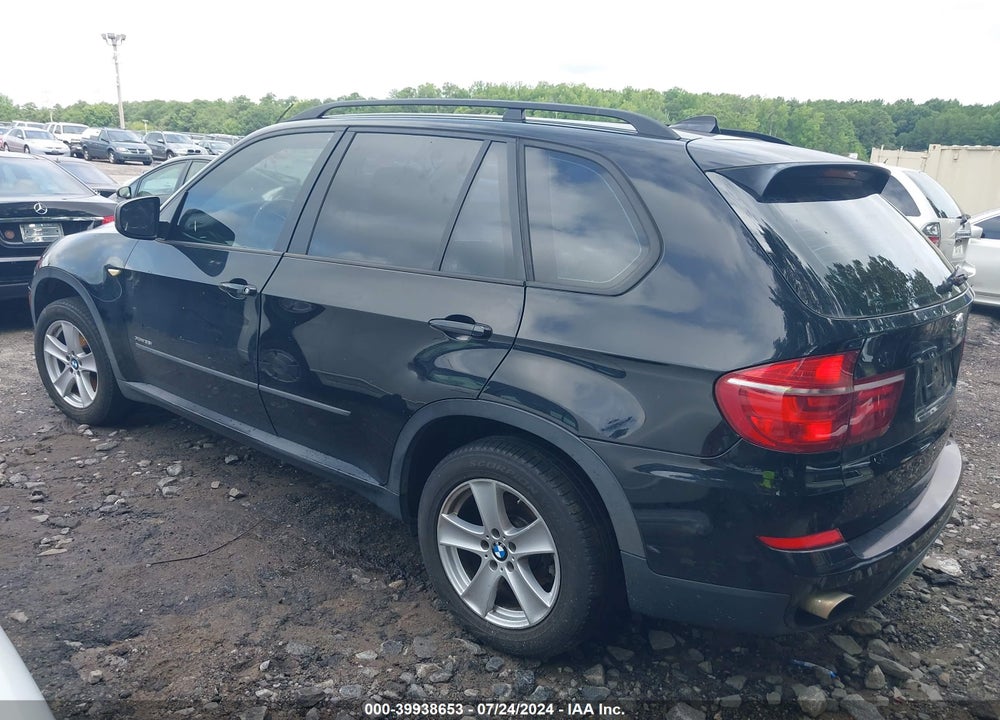 2012 BMW X5 XDRIVE35I/XDRIVE35I PREMIUM/XDRIVE35I SPORT ACTIVITY VIN: 5UXZV4C50CL988423