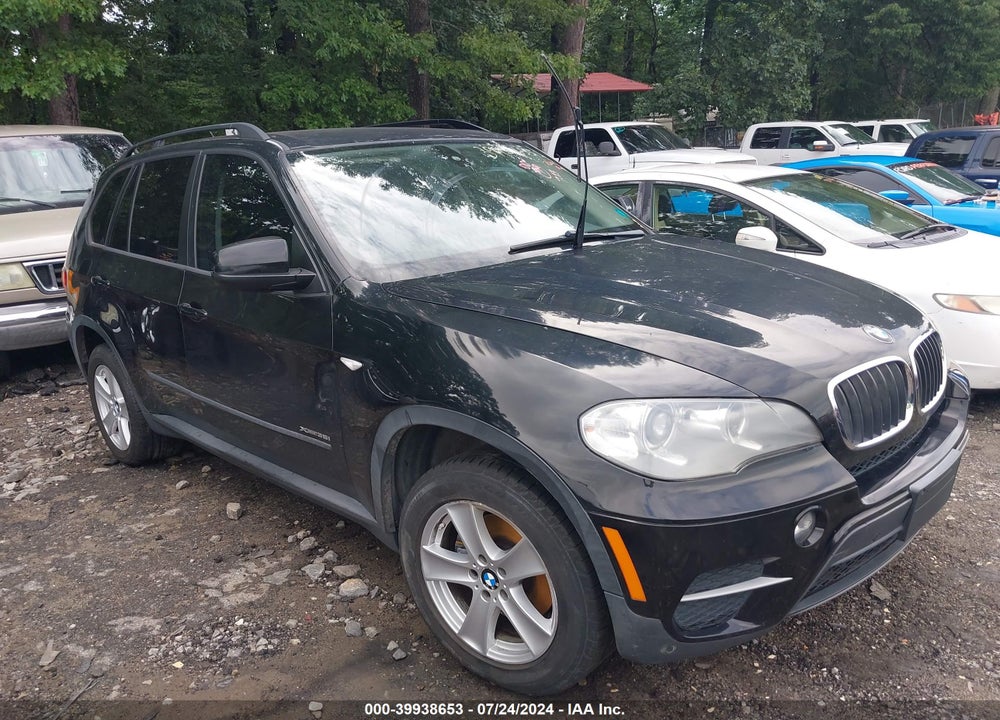 2012 BMW X5 XDRIVE35I/XDRIVE35I PREMIUM/XDRIVE35I SPORT ACTIVITY VIN: 5UXZV4C50CL988423