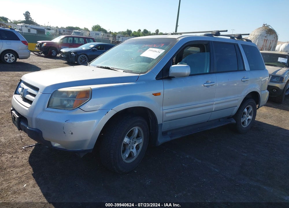 2007 HONDA PILOT EX-L VIN: 2HKYF18717H516406