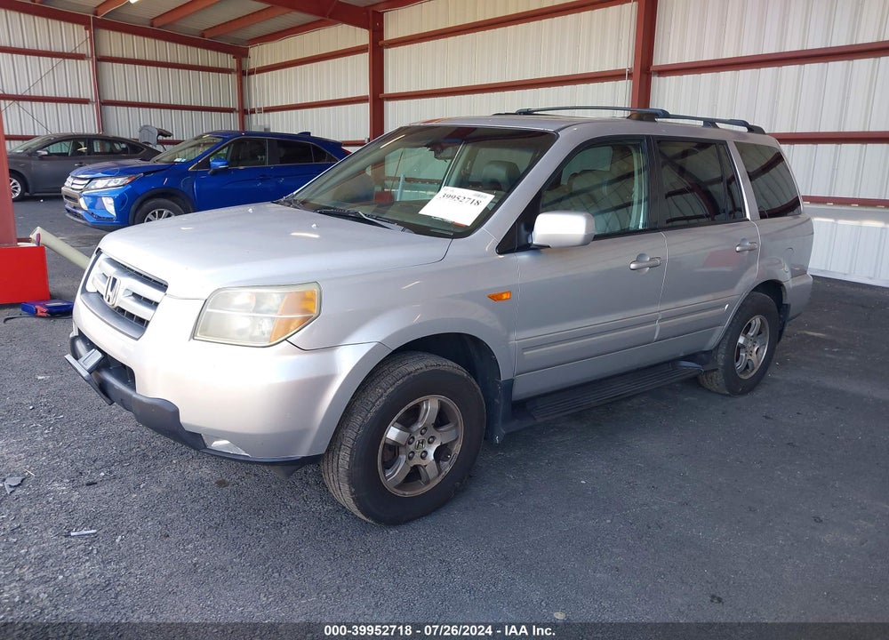 2006 HONDA PILOT EX-L VIN: 5FNYF18666B005780