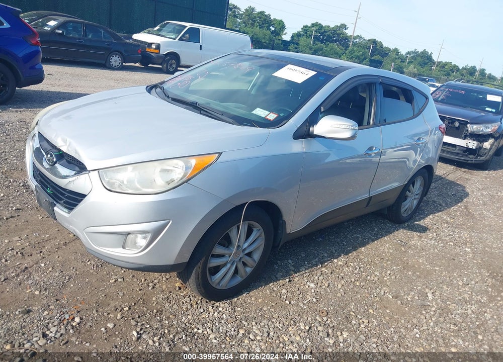 2013 HYUNDAI TUCSON LIMITED VIN: KM8JUCAC8DU727822