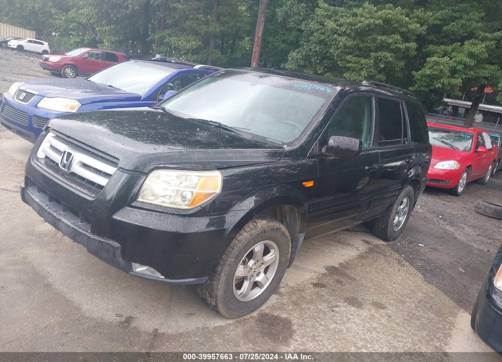 2007 HONDA PILOT EX-L VIN: 5FNYF28557B042771