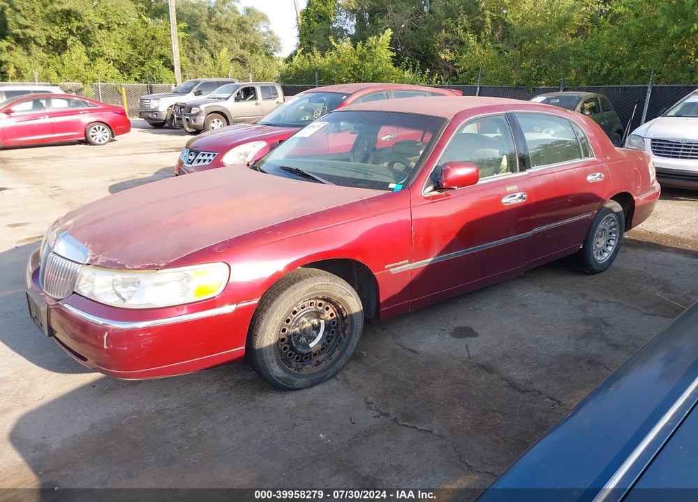 1999 LINCOLN TOWN CAR CARTIER VIN: 1LNHM83W9XY671440