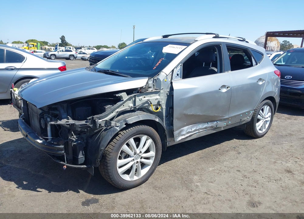 2013 HYUNDAI TUCSON LIMITED VIN: KM8JU3AC4DU561959