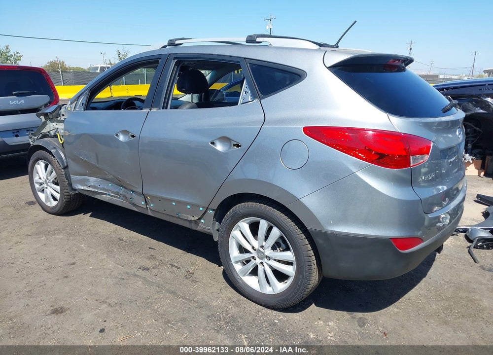 2013 HYUNDAI TUCSON LIMITED VIN: KM8JU3AC4DU561959