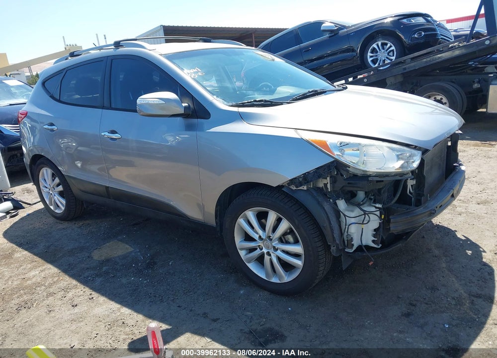 2013 HYUNDAI TUCSON LIMITED VIN: KM8JU3AC4DU561959