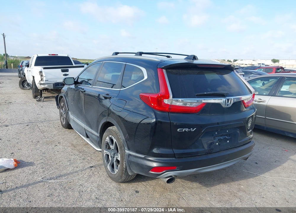 2018 HONDA CR-V TOURING VIN: 7FARW1H99JE007552