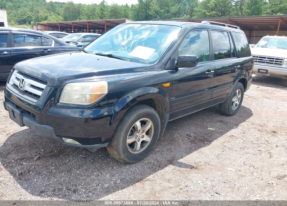 2007 HONDA PILOT EX-L VIN: 5FNYF28527B036023
