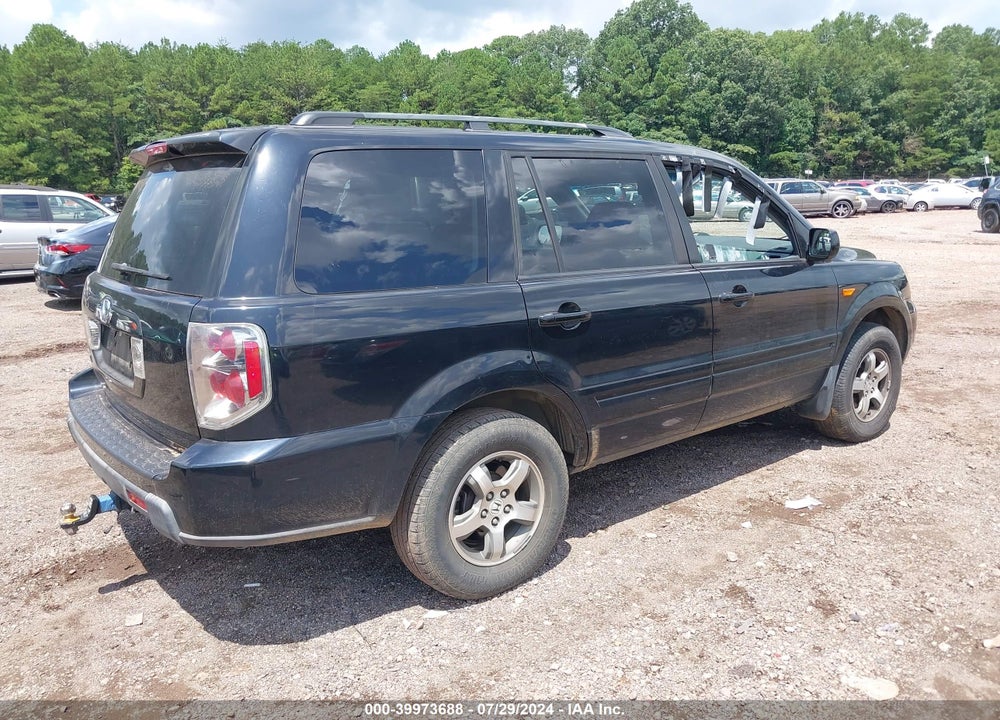 2007 HONDA PILOT EX-L VIN: 5FNYF28527B036023