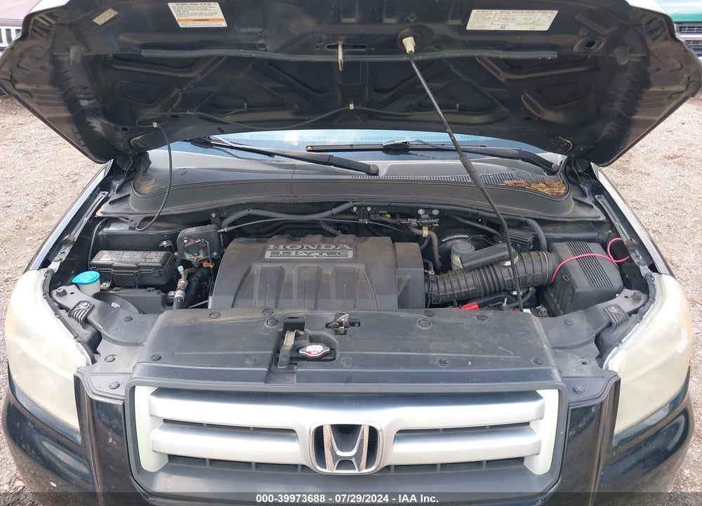 2007 HONDA PILOT EX-L VIN: 5FNYF28527B036023