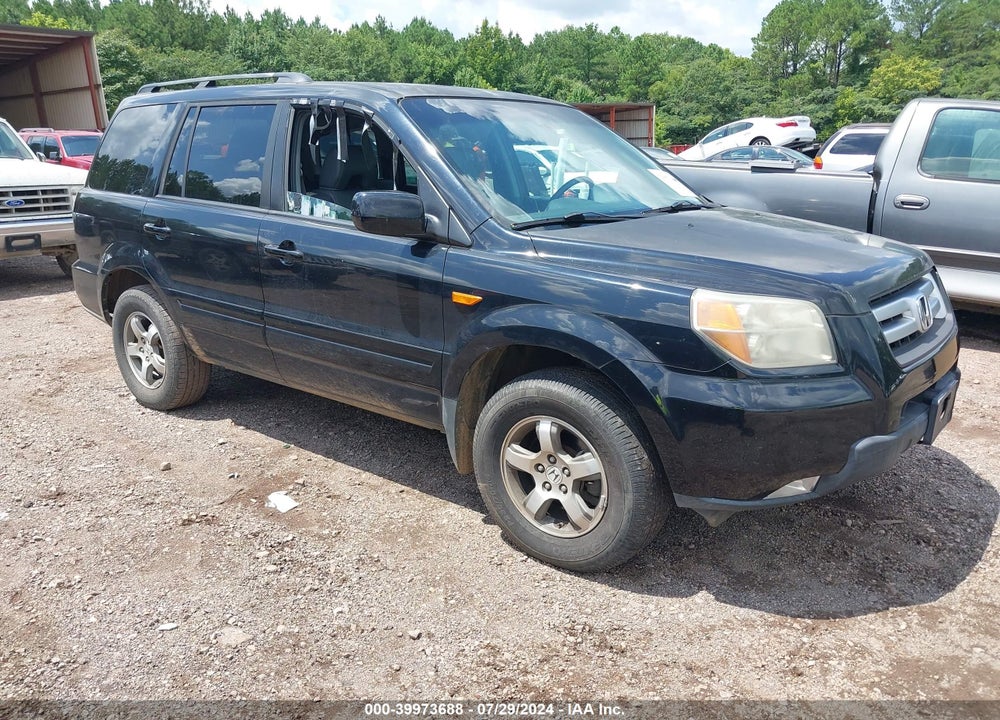 2007 HONDA PILOT EX-L VIN: 5FNYF28527B036023