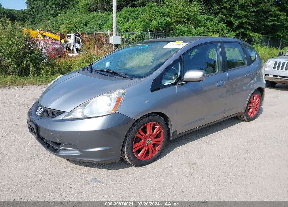 2009 HONDA FIT SPORT VIN: JHMGE874X9S040447