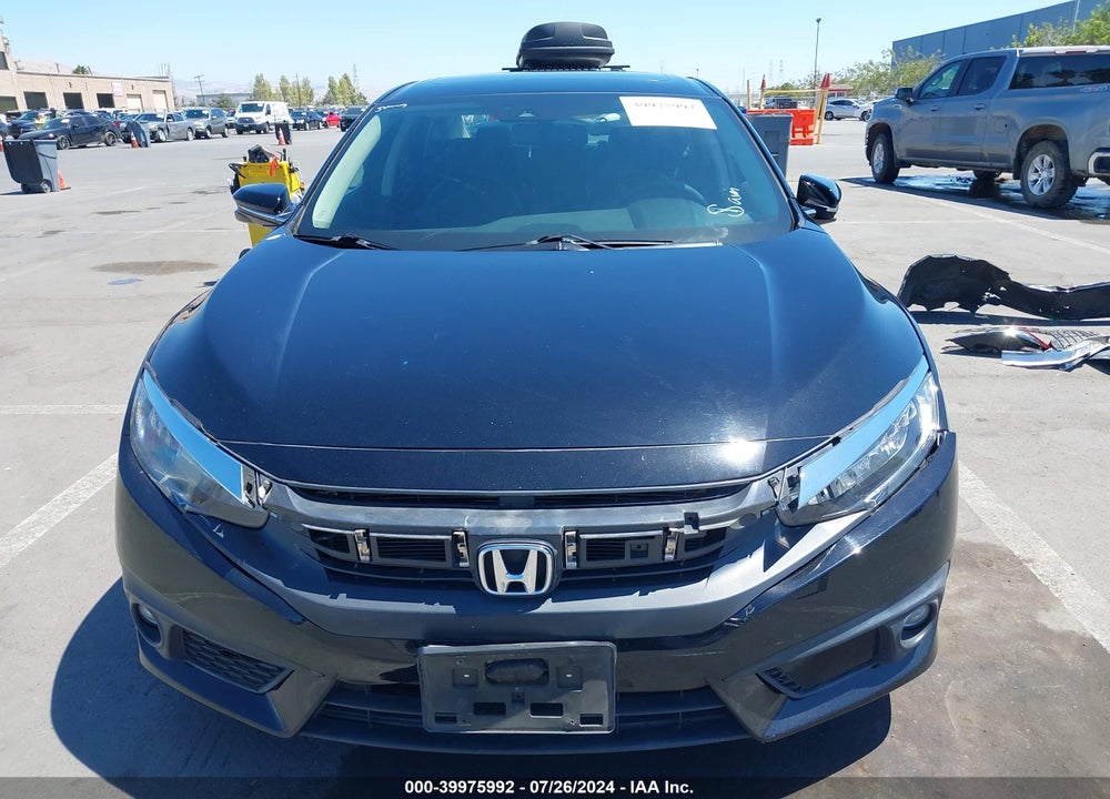 2016 HONDA CIVIC TOURING VIN: 19XFC1F98GE210652