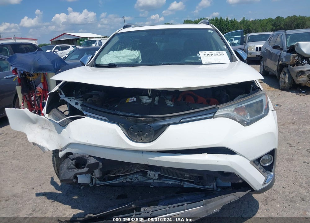 2016 TOYOTA RAV4 HYBRID XLE VIN: JTMRJREV4GD059147