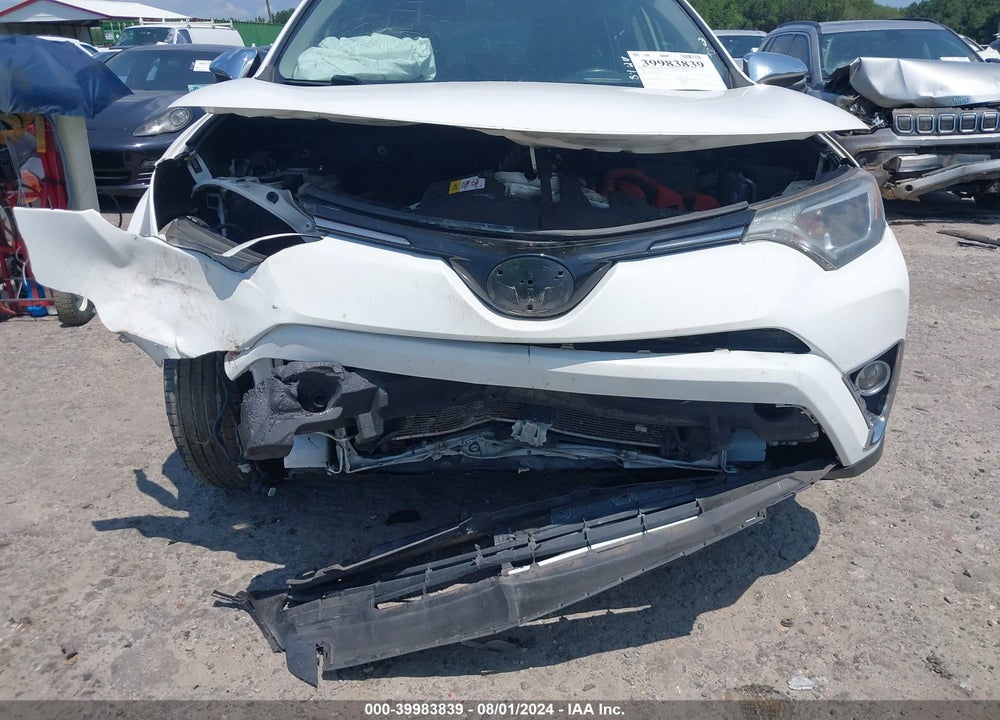 2016 TOYOTA RAV4 HYBRID XLE VIN: JTMRJREV4GD059147
