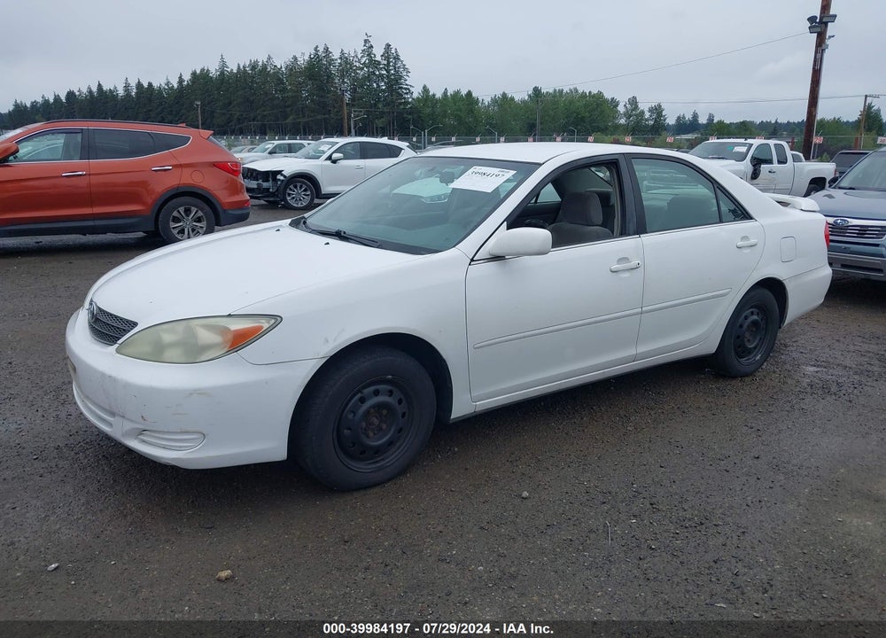 2003 TOYOTA CAMRY LE VIN: JTDBE32K830182884