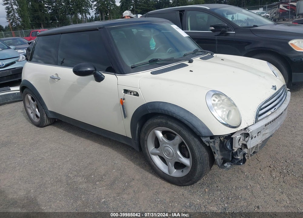 2006 MINI COOPER VIN: WMWRC33596TK64023