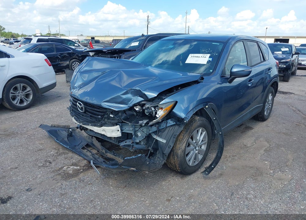 2016 MAZDA CX-5 TOURING VIN: JM3KE2CY9G0811093