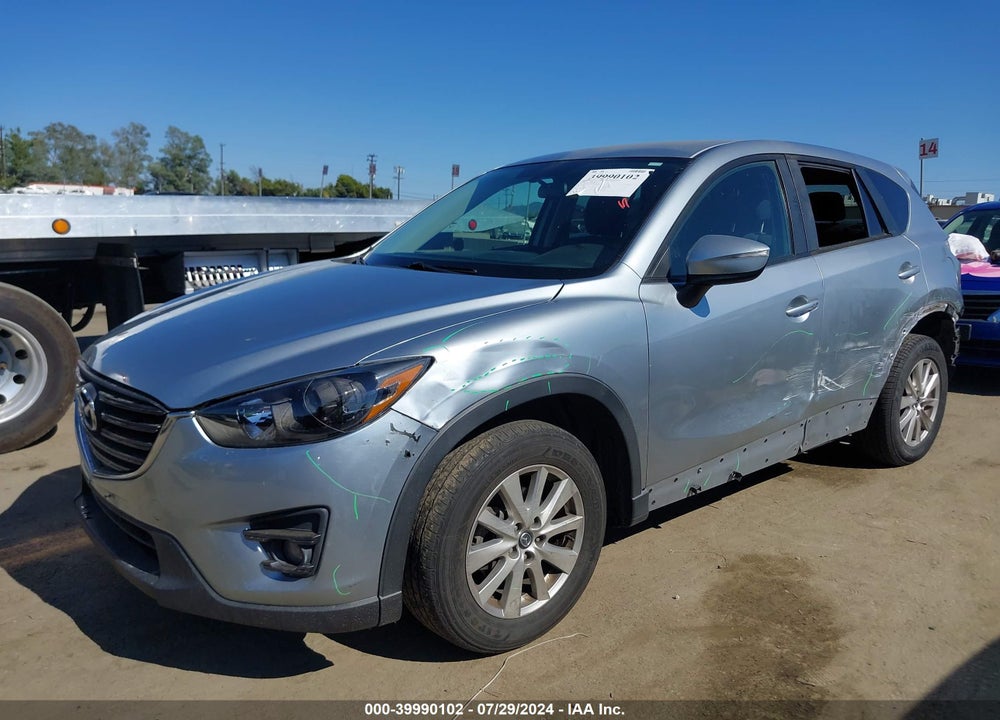 2016 MAZDA CX-5 TOURING VIN: JM3KE2CY4G0909612